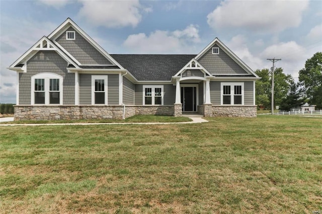 2626 Center Ave, Wildwood, MO 63040 - craftsman house with stone siding and a front lawn