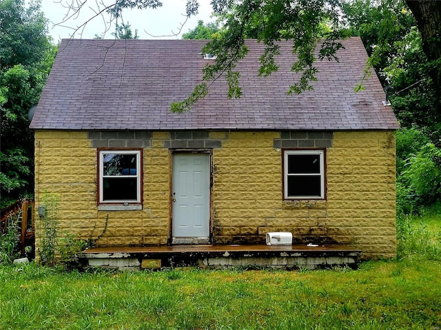 118 Kinder St, Cahokia, IL 62206 - view of front facade featuring a shingled roof and stone siding