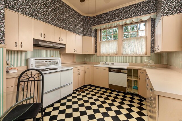 202 Poplar St, Harrisburg, IL 62946 - kitchen featuring under cabinet range hood, white appliances, wallpapered walls, dark floors, and ornamental molding