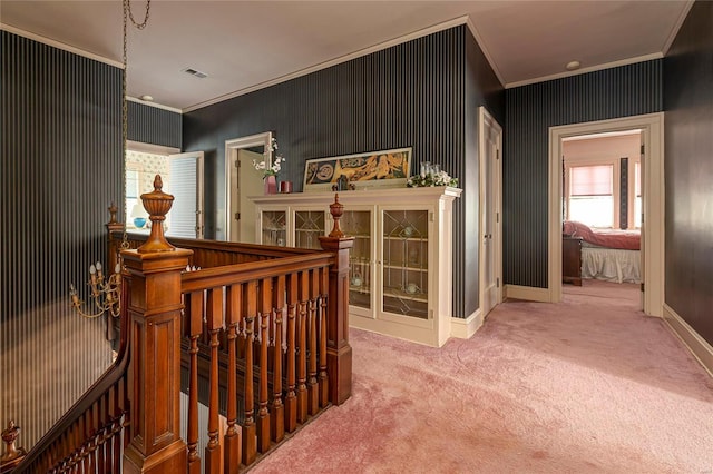 202 Poplar St, Harrisburg, IL 62946 - corridor with ornamental molding, carpet flooring, an upstairs landing, and baseboards
