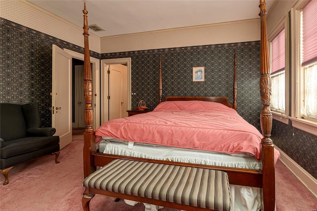 202 Poplar St, Harrisburg, IL 62946 - carpeted bedroom with wallpapered walls