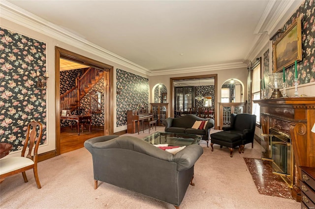 202 Poplar St, Harrisburg, IL 62946 - living room with ornamental molding, light colored carpet, baseboards, and stairs