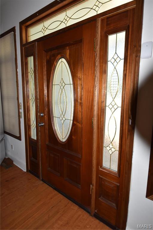 7617 Ivory Ave, Saint Louis, MO 63111 - foyer entrance with wood finished floors
