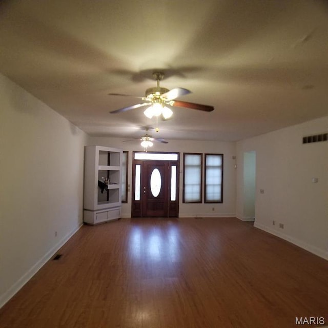 7617 Ivory Ave, Saint Louis, MO 63111 - foyer entrance with ceiling fan, wood finished floors, and baseboards
