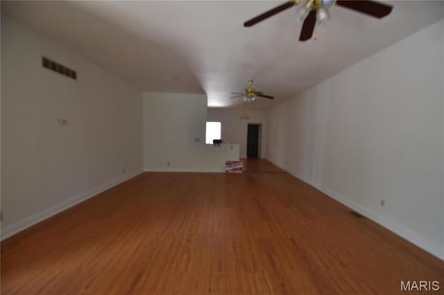 7617 Ivory Ave, Saint Louis, MO 63111 - spare room with a ceiling fan, wood finished floors, and baseboards