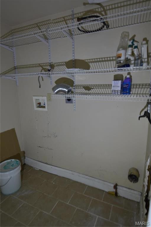 7617 Ivory Ave, Saint Louis, MO 63111 - washroom with hookup for a washing machine, electric dryer hookup, baseboards, and tile patterned flooring