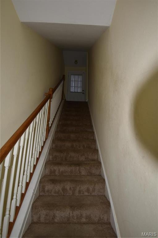 7617 Ivory Ave, Saint Louis, MO 63111 - stairway with carpet flooring and baseboards