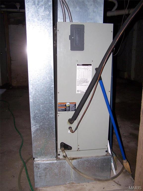 7617 Ivory Ave, Saint Louis, MO 63111 - utility room with heating unit