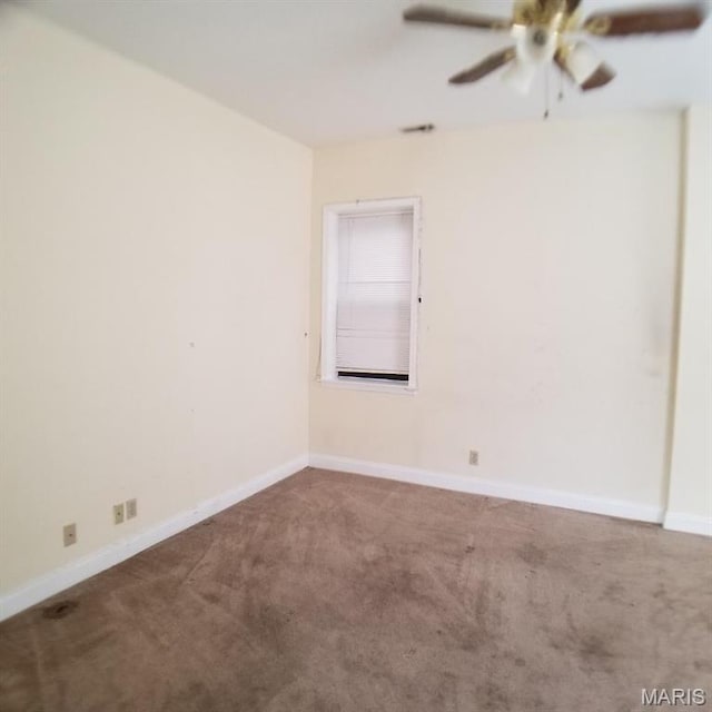 7617 Ivory Ave, Saint Louis, MO 63111 - spare room with carpet, a ceiling fan, and baseboards