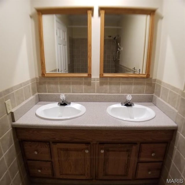 7617 Ivory Ave, Saint Louis, MO 63111 - bathroom with double vanity and tile walls