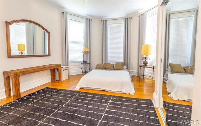 3630 Flad Ave, Saint Louis, MO 63110 - bedroom featuring wood finished floors