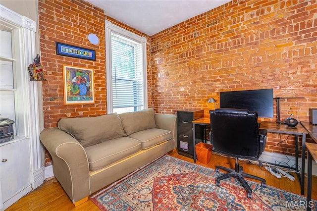 3630 Flad Ave, Saint Louis, MO 63110 - home office featuring wood finished floors and brick wall