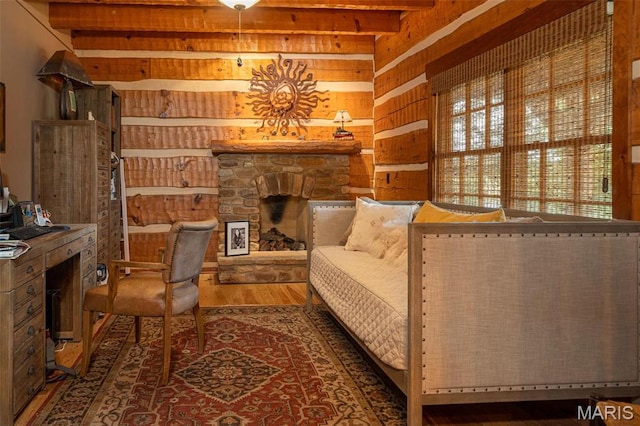 5140 Saint Anns Rd, Washington, MO 63090 - bedroom with a fireplace, wooden walls, and wood finished floors