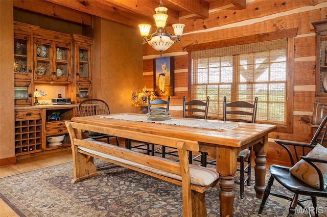 5140 Saint Anns Rd, Washington, MO 63090 - dining space with wood finished floors and beam ceiling