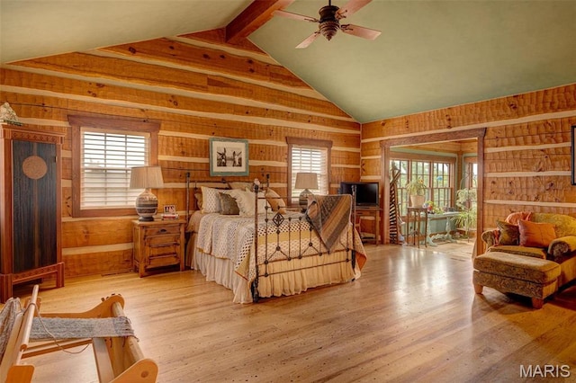 5140 Saint Anns Rd, Washington, MO 63090 - bedroom with wood walls, access to exterior, and light wood finished floors