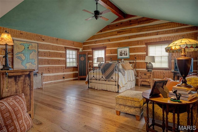 5140 Saint Anns Rd, Washington, MO 63090 - living room featuring wood walls, ceiling fan, healthy amount of natural light, and wood finished floors