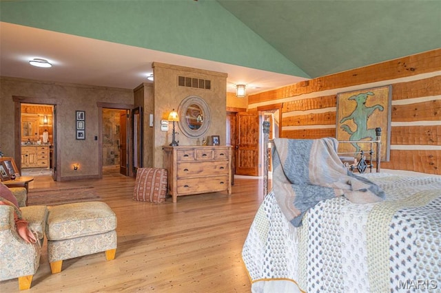 5140 Saint Anns Rd, Washington, MO 63090 - bedroom with wood finished floors and vaulted ceiling