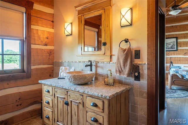 5140 Saint Anns Rd, Washington, MO 63090 - bathroom featuring vanity, tile walls, and wainscoting