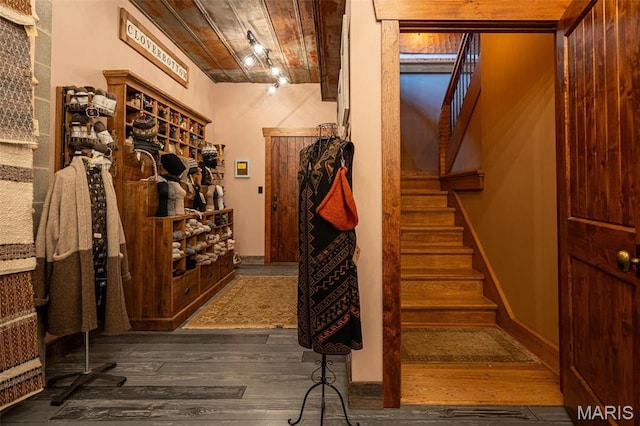 5140 Saint Anns Rd, Washington, MO 63090 - staircase featuring hardwood / wood-style floors, wood ceiling, and baseboards