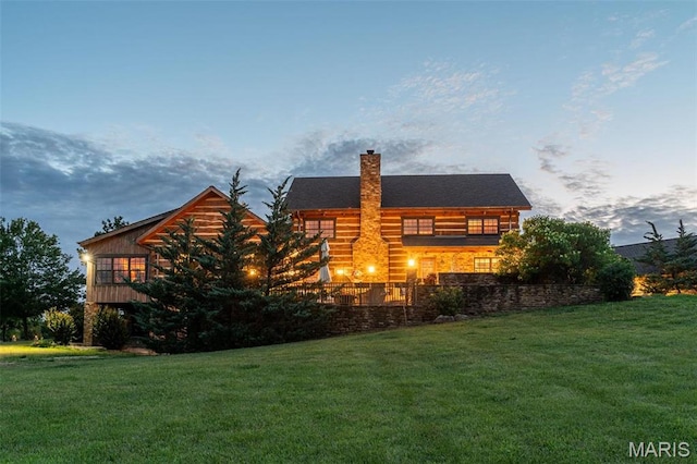5140 Saint Anns Rd, Washington, MO 63090 - property exterior at dusk featuring a chimney and a yard