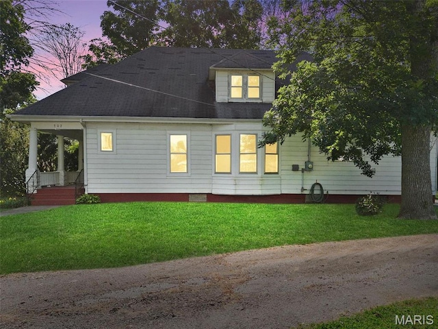 302 E Walsh St, Montgomery City, MO 63361 - view of home's exterior with a yard and a shingled roof