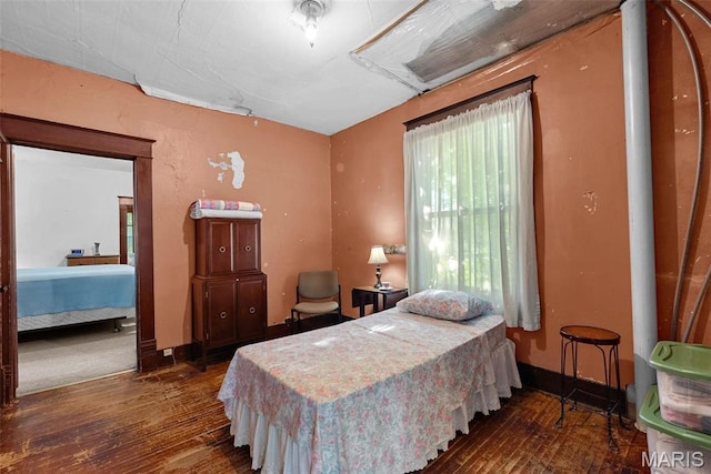 302 E Walsh St, Montgomery City, MO 63361 - bedroom with hardwood / wood-style floors