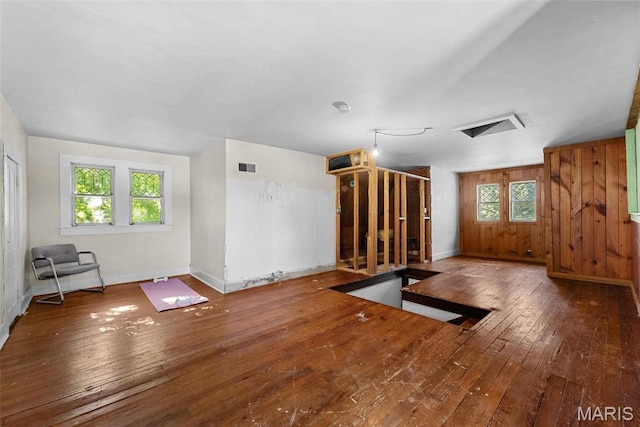 302 E Walsh St, Montgomery City, MO 63361 - additional living space with hardwood / wood-style floors and baseboards