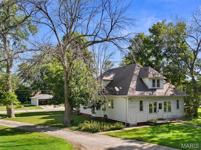 302 E Walsh St, Montgomery City, MO 63361 - view of property exterior featuring a yard