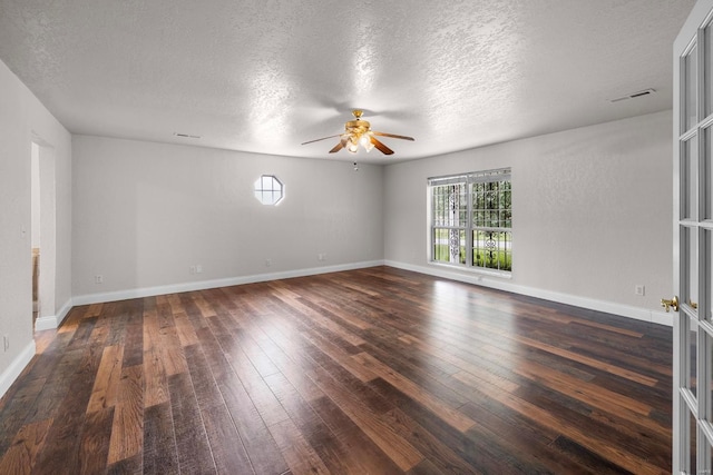 547 County Road 448, Poplar Bluff, MO 63901 - unfurnished room with ceiling fan, a textured ceiling, hardwood / wood-style floors, and baseboards
