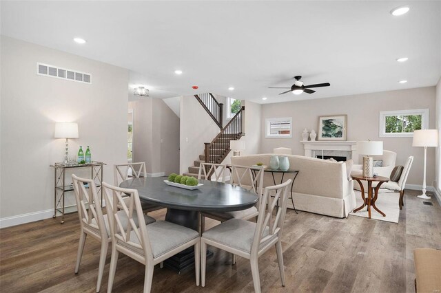 8817 Moritz Ave, Saint Louis, MO 63144 - dining space featuring baseboards, stairs, a ceiling fan, wood finished floors, and recessed lighting