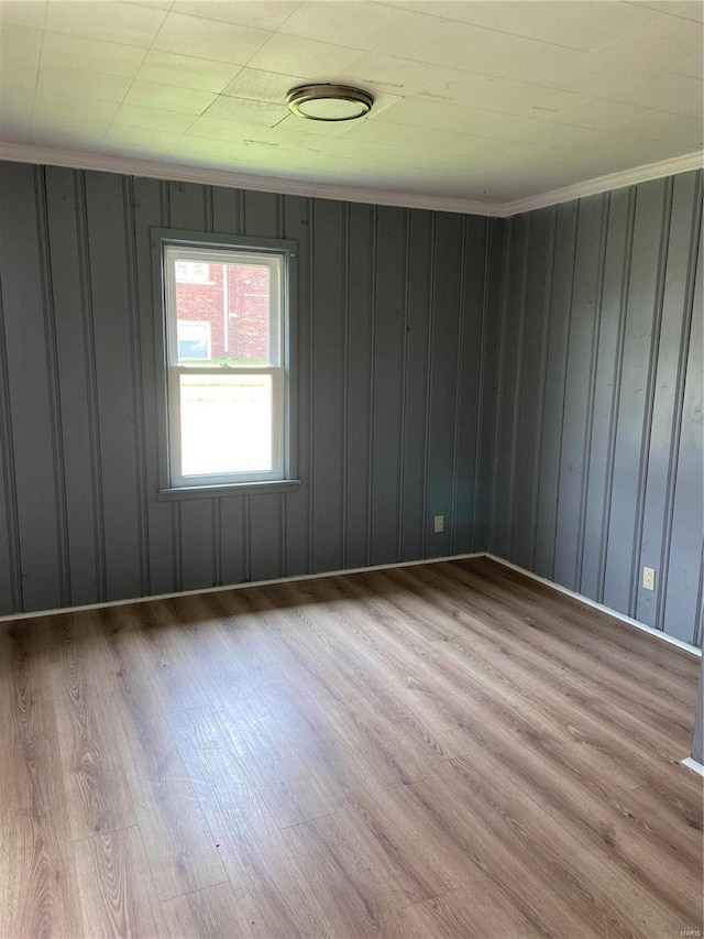 2600 E 25th St, Granite City, IL 62040 - spare room with wood finished floors and crown molding