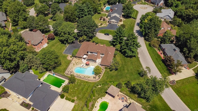 aerial view of residential area featuring a pool area