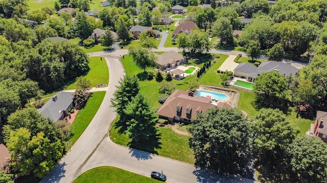 aerial view of residential area featuring a pool area