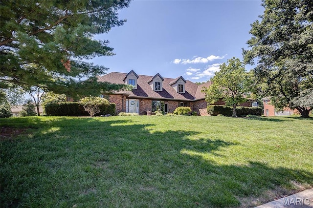 6 Red Fox Rd, Belleville, IL 62223 - cape cod house with a front yard and brick siding