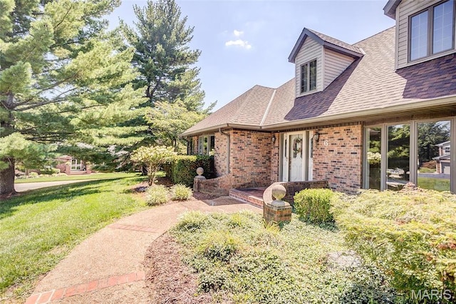 6 Red Fox Rd, Belleville, IL 62223 - view of front facade with brick siding, a front lawn, and roof with shingles
