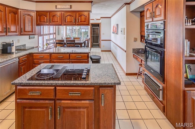 6 Red Fox Rd, Belleville, IL 62223 - kitchen featuring black appliances, ornamental molding, a warming drawer, light tile patterned floors, and brown cabinetry
