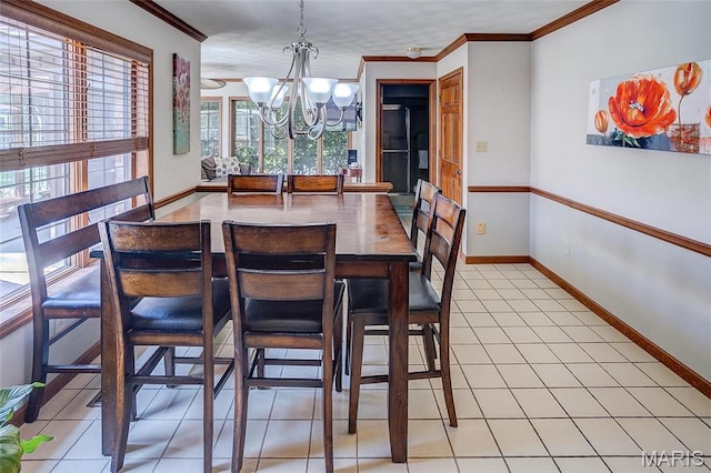 6 Red Fox Rd, Belleville, IL 62223 - dining area featuring a chandelier, baseboards, crown molding, and light tile patterned flooring