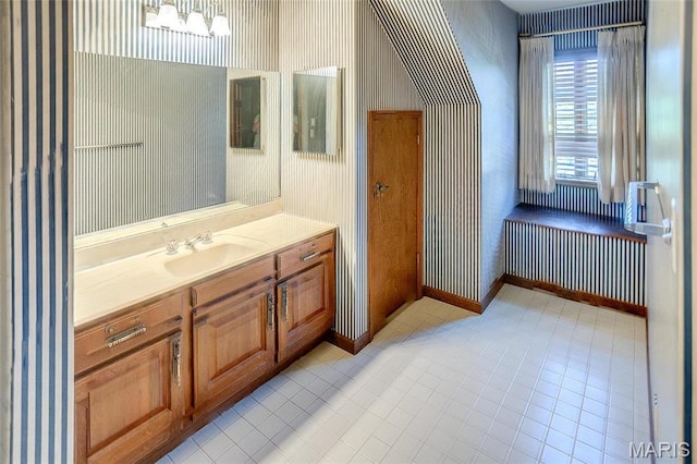 6 Red Fox Rd, Belleville, IL 62223 - bathroom featuring wallpapered walls, vanity, and baseboards