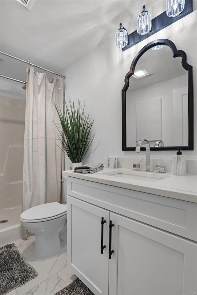 full bath featuring marble look tiles, toilet, vanity, and a shower stall