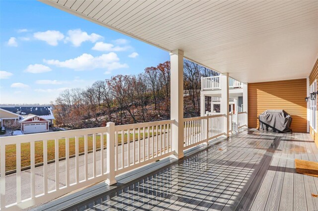 wooden deck featuring grilling area