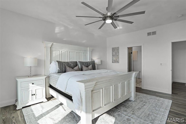 310 Captains Ct, Grafton, IL 62037 - bedroom with baseboards, wood finished floors, and a ceiling fan