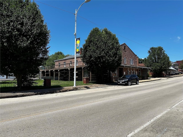 156 S Main St, Ironton, MO 63650 - view of asphalt road with sidewalks, street lights, and curbs