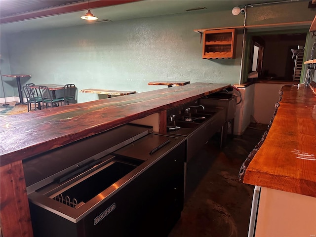 156 S Main St, Ironton, MO 63650 - bar area featuring a textured wall