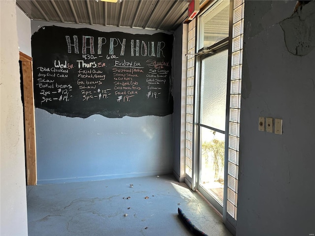 156 S Main St, Ironton, MO 63650 - spare room with concrete floors
