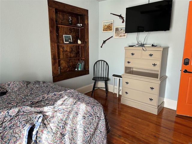 156 S Main St, Ironton, MO 63650 - bedroom with dark wood-type flooring and baseboards