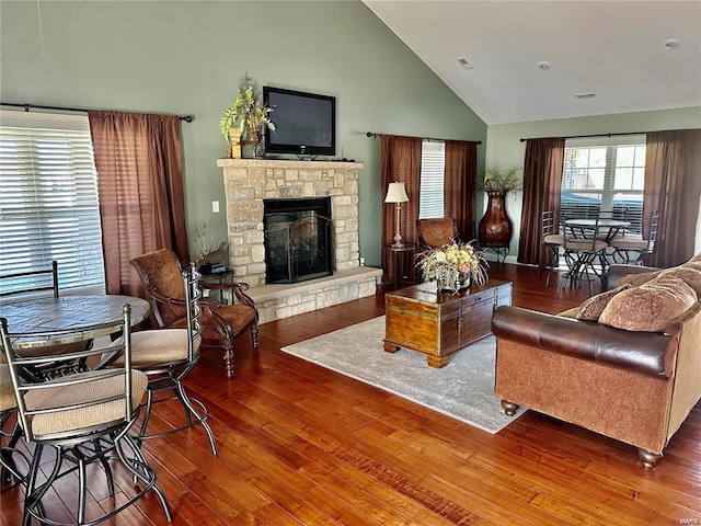 351 Cherry Creek Ln, Farmington, MO 63640 - living room with high vaulted ceiling, wood finished floors, and a stone fireplace