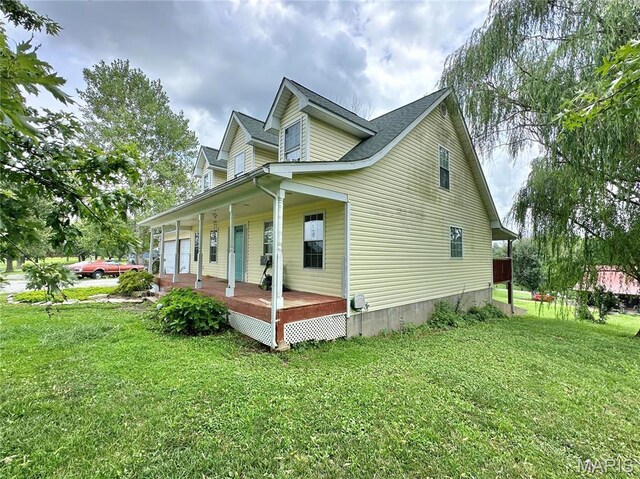 6624 State Route C, Saint Genevieve, MO 63670 - view of side of home featuring a porch and a yard