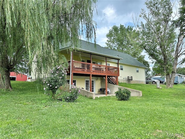 6624 State Route C, Saint Genevieve, MO 63670 - rear view of house with a deck, a lawn, and a patio