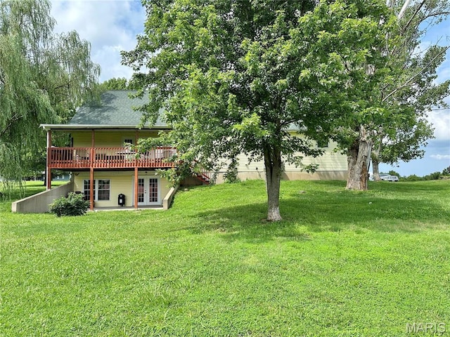 6624 State Route C, Saint Genevieve, MO 63670 - view of green lawn with french doors and a wooden deck