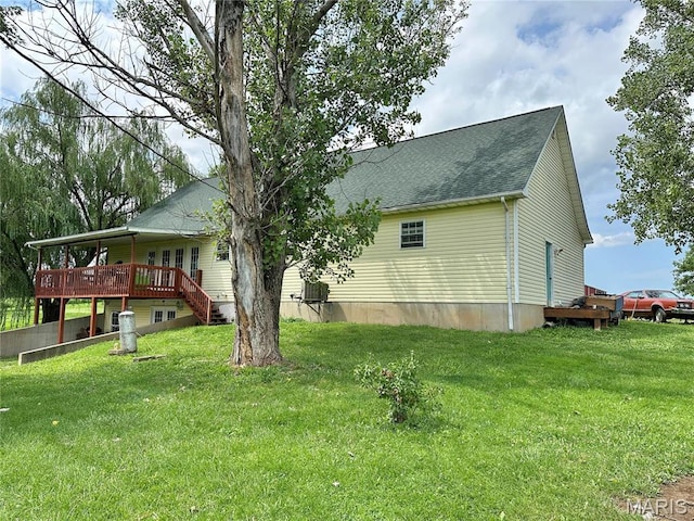 6624 State Route C, Saint Genevieve, MO 63670 - view of side of home with a wooden deck, a shingled roof, and a yard